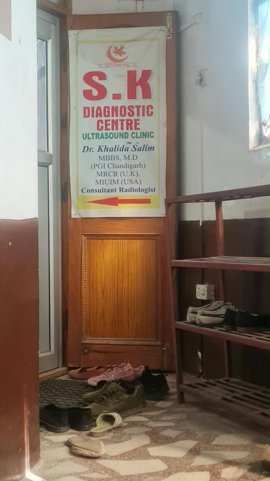 Photo 6: Sign identifying S.K. Diagnostic Centre and Dr. Khalida Salim